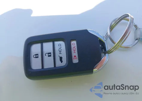 2015 Honda Cr-V Touring z USA, uszkodzony, nr VIN 5J6RM4H92FL116338